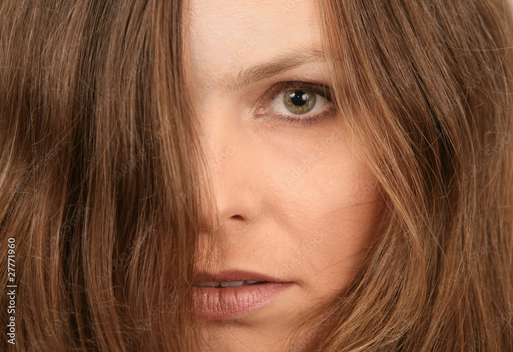 Closeup portrait of a beautiful young woman with long light brow Closeup portrait of a beautiful young woman with long light brow
