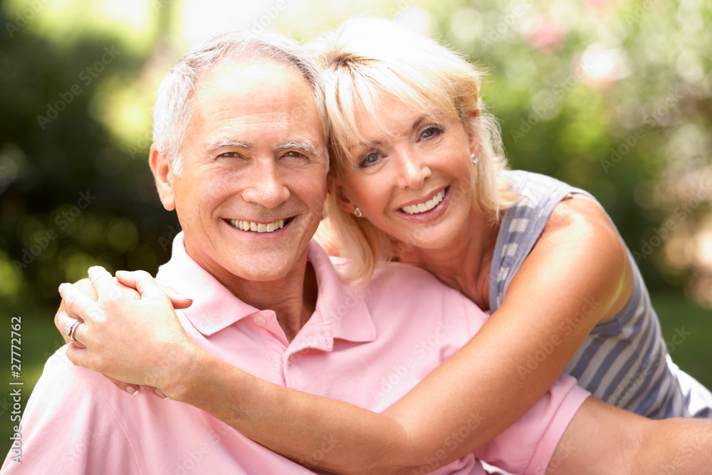 Senior couple relaxing together in park Senior couple relaxing together in park