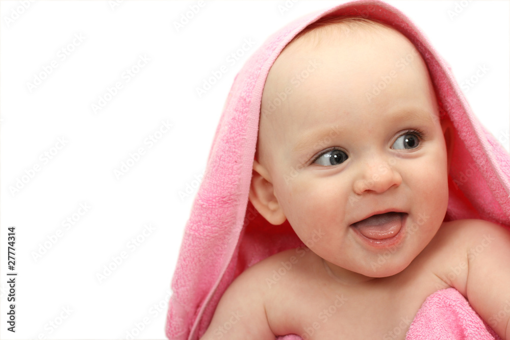 Smiling little baby wrapped in a pink towel on white background Smiling little baby wrapped in a pink towel on white background