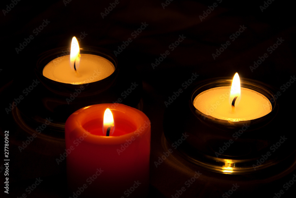 Three candles in the dark
