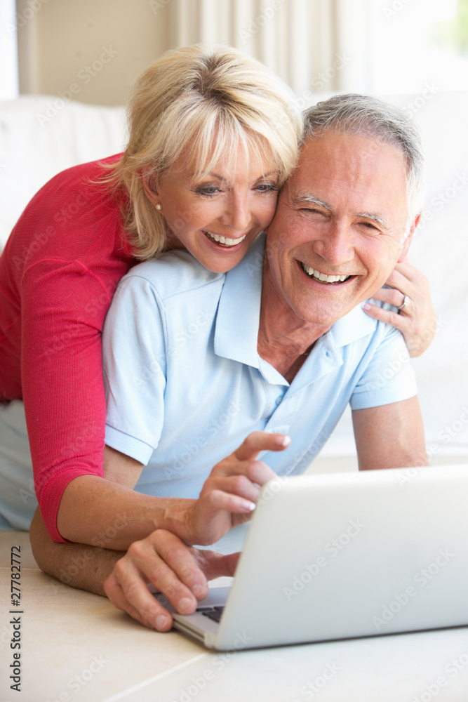 Senior couple on her laptop computer