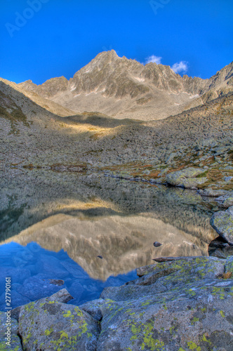 mountain reflecting in a tarn (alpine lake)