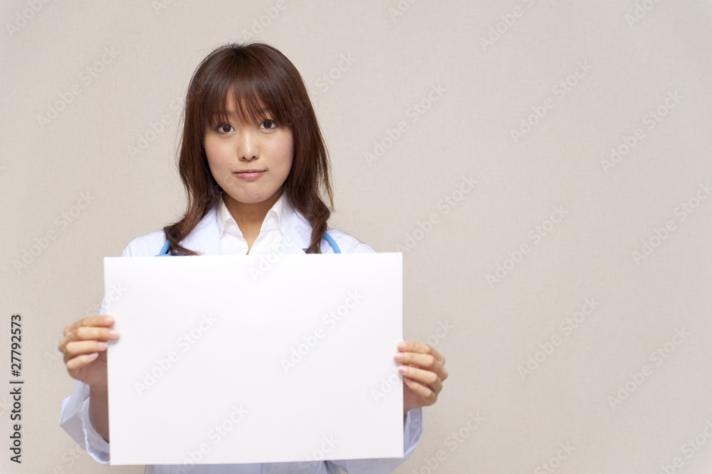 a portrait of young doctor taking a blank whiteboard a portrait of young doctor taking a blank whiteboard