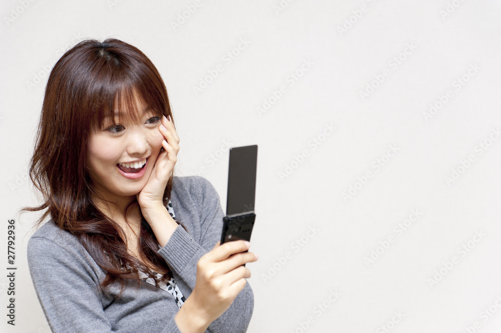 a portrait of beautiful woman using cellphone a portrait of beautiful woman using cellphone