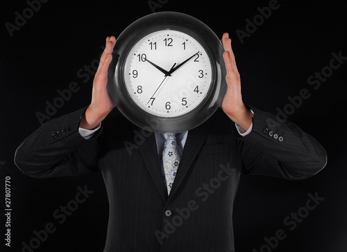 man holds hours