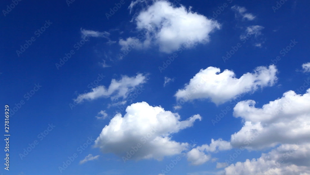 Time lapse, white fluffy clouds over blue sky Time lapse, white fluffy clouds over blue sky