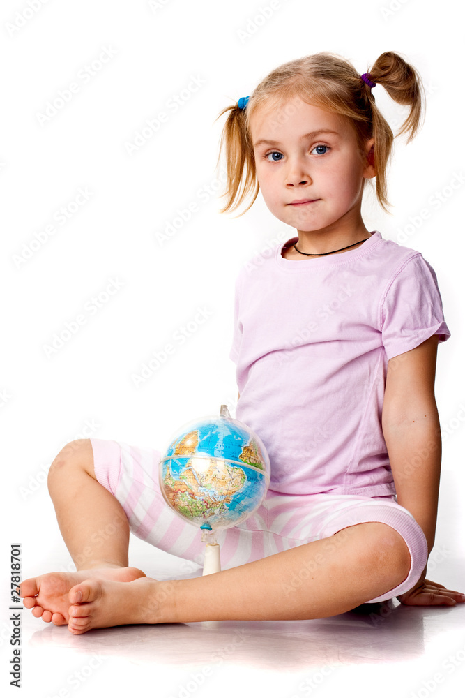 Beautiful girl playing with a globe Beautiful girl playing with a globe