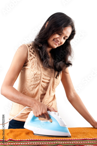 Indian girl and electric steam iron