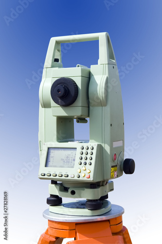 Theodolite measurement instrument isolated over gradient blue