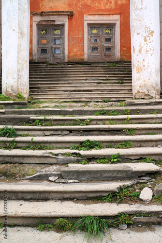 aging stairway in destroyed house