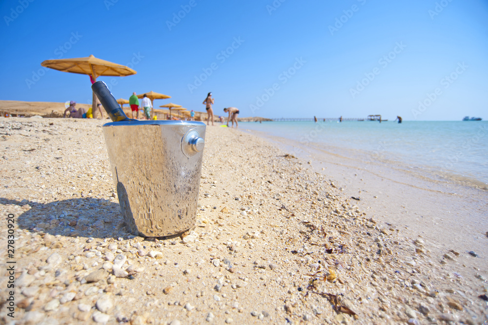 Bottle of wine on a tropical beach Bottle of wine on a tropical beach