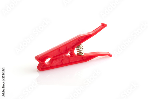 Red clothespin isolated on white background
