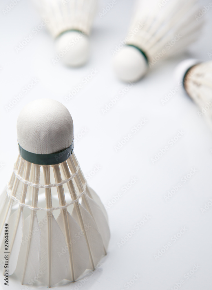 Badminton shuttlecocks on white. (color toned image)