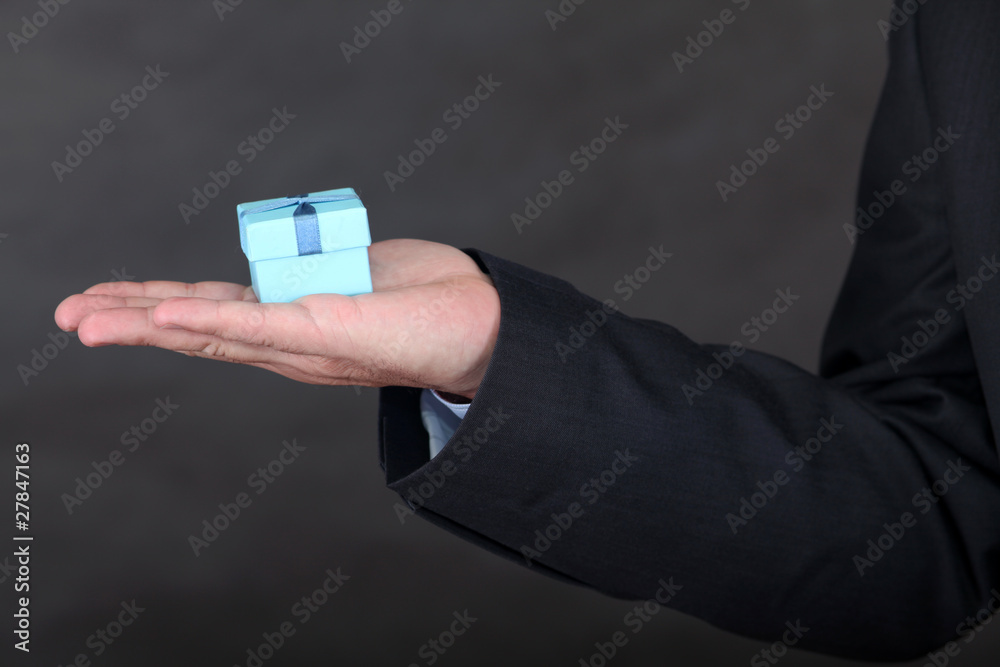 Fototapeta premium Little Gift Box in man hand