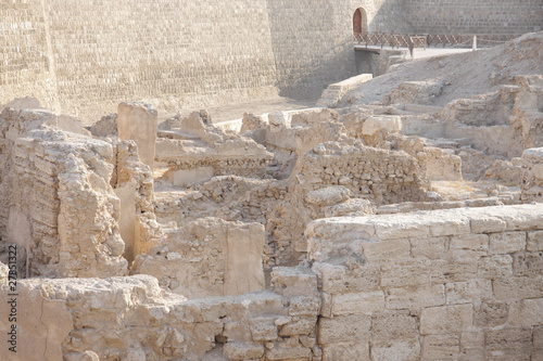 Fototapeta Naklejka Na Ścianę i Meble -  Excavated ruins near the entrance of restored Bahrain fort