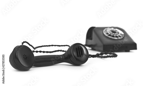 old bakelite telephone on white