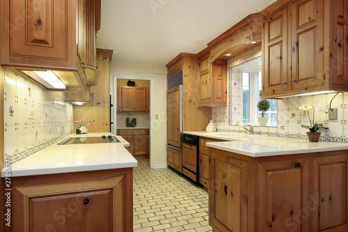 Country kitchen with wood cabinets