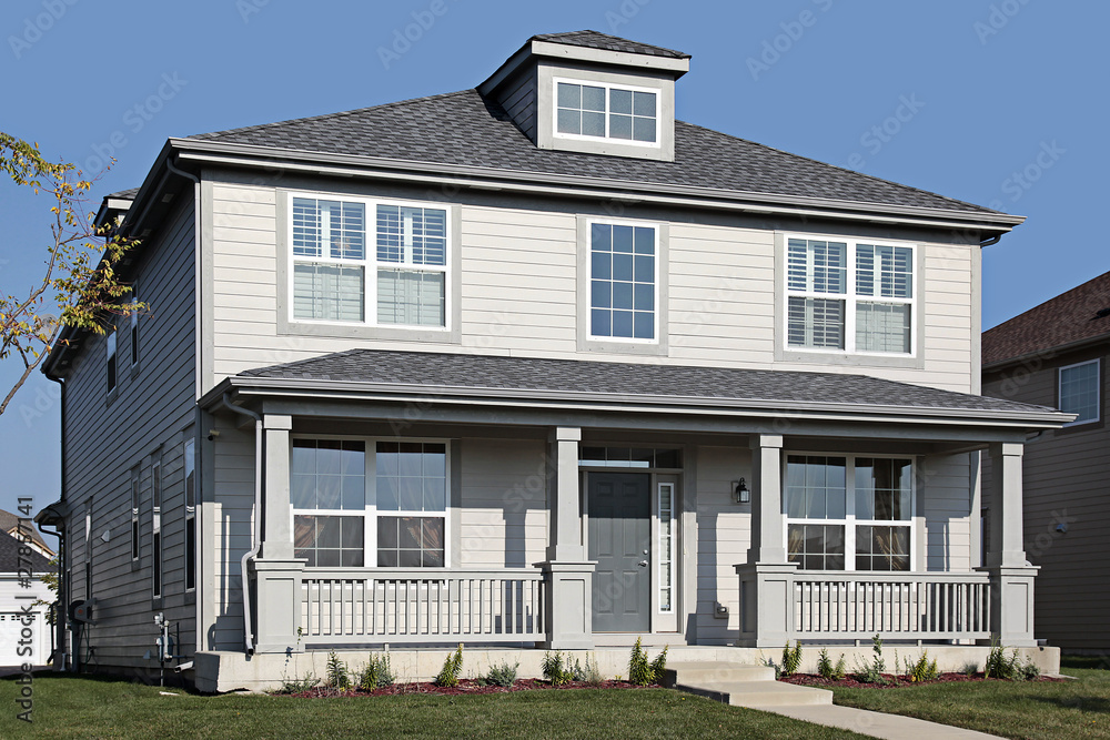 Gray home with front porch Gray home with front porch