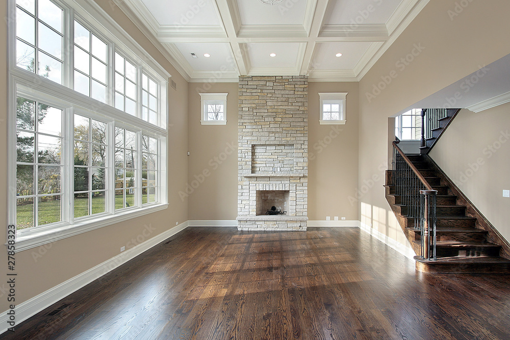 Family room with two story fireplace - obrazy, fototapety, plakaty 