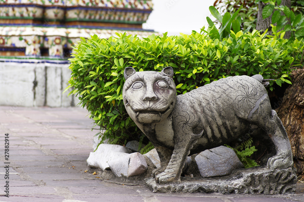 tiger stone statue in wat po,bangkok,thailand