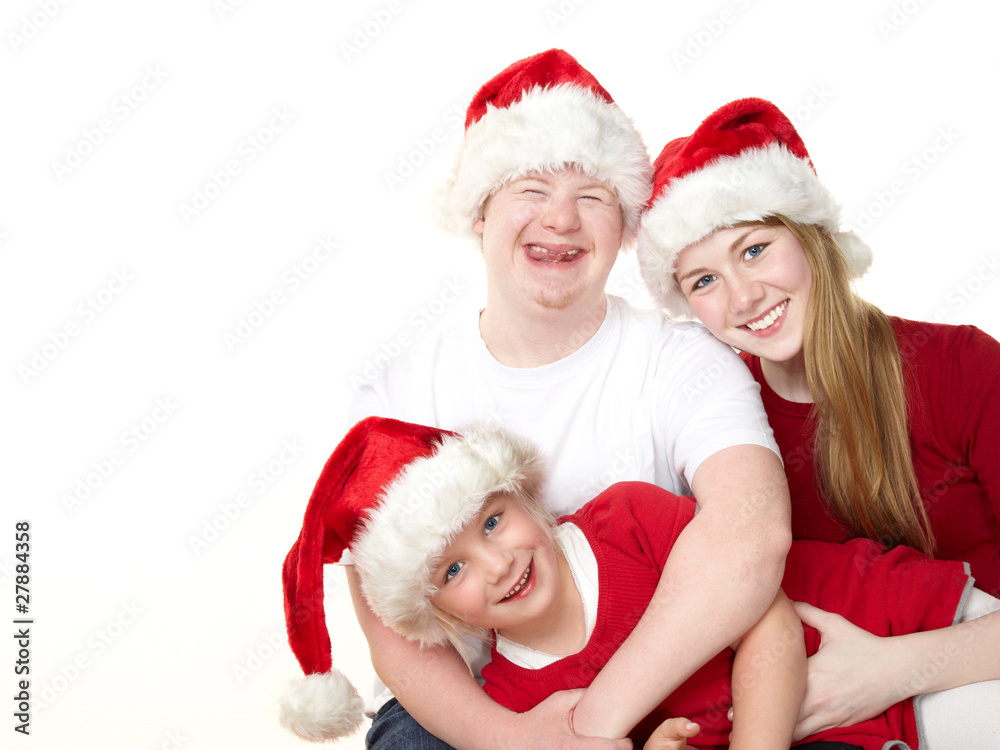 Three kids dressed up as Santa Claus have fun Three kids dressed up as Santa Claus have fun