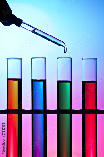 Test tubes filled with colored fluid