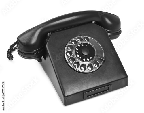 old bakelite telephone on white photo