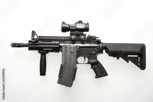 Fototapeta Heavily used military M16 rifle with short barrel