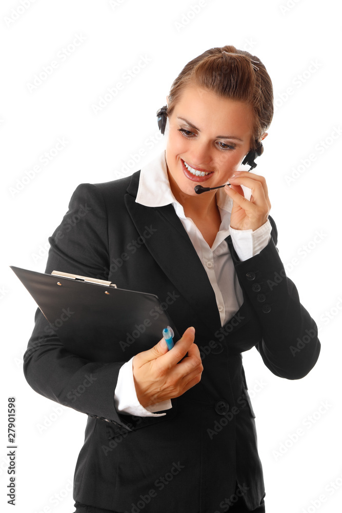 Smiling modern business woman with headset and clipboard Smiling modern business woman with headset and clipboard