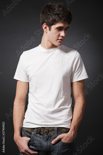 Happy man wearing white T-shirt. © Mirma