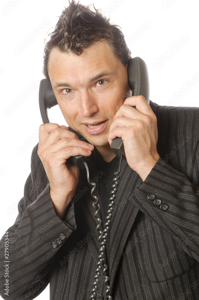 Business-Punk telefoniert auf zwei Leitungen Business-Punk telefoniert auf zwei Leitungen