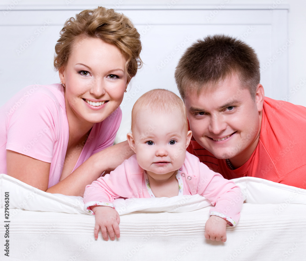 Portrait of the Beautiful young happy family Portrait of the Beautiful young happy family