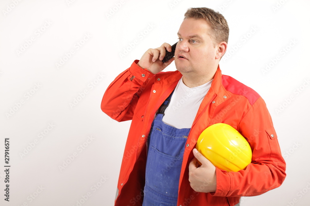 Bauarbeiter beim Telefonieren