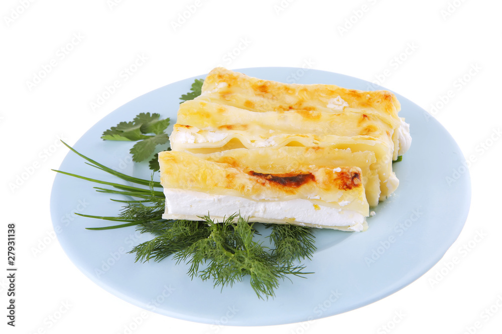 cheese cannelloni on blue plate