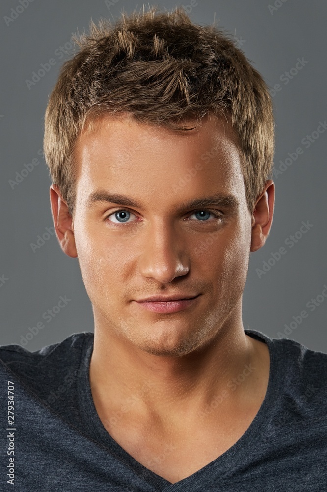 Obraz premium Close-up portrait of a young handsome man