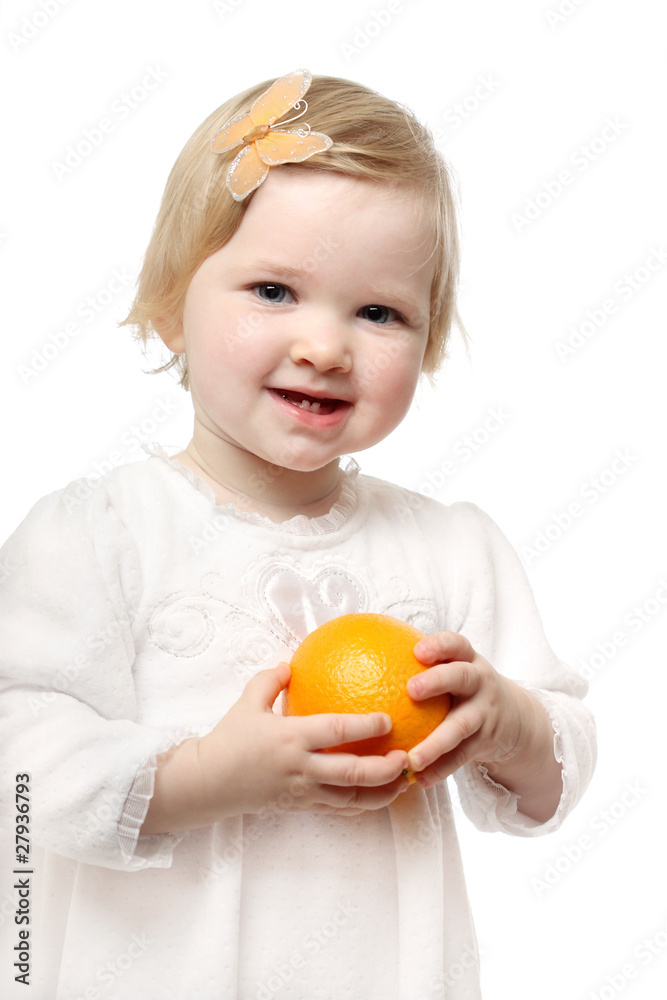 Smiling baby with orange Smiling baby with orange