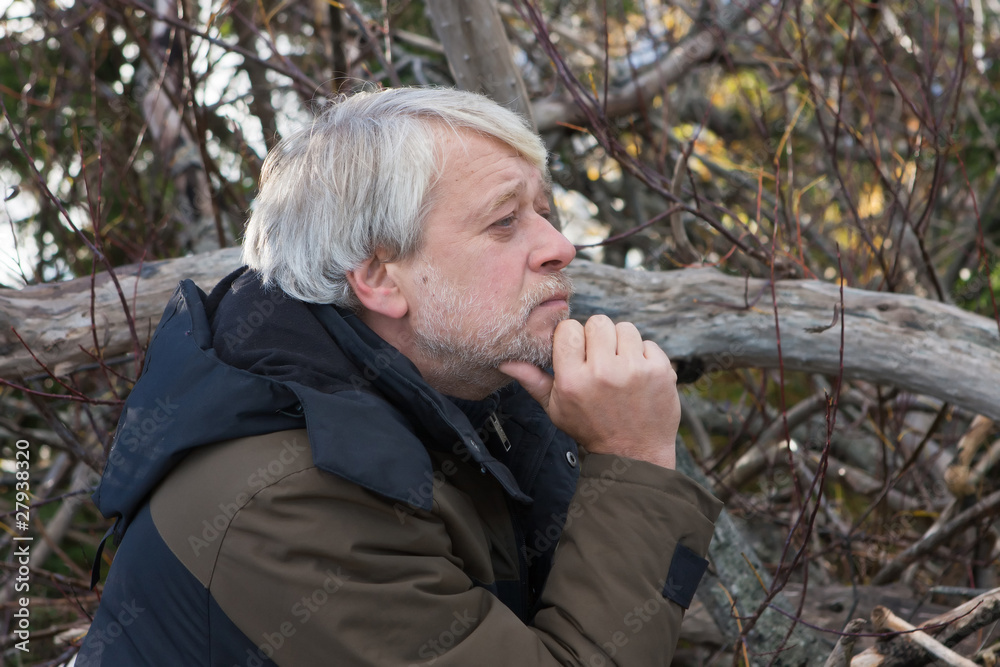 Middle-aged man in forest. Middle-aged man in forest.