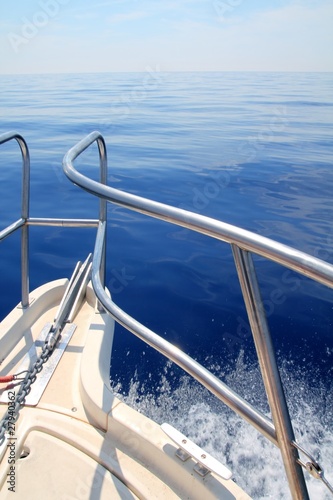 boat sailing blue calm ocean sea bow railing © lunamarina