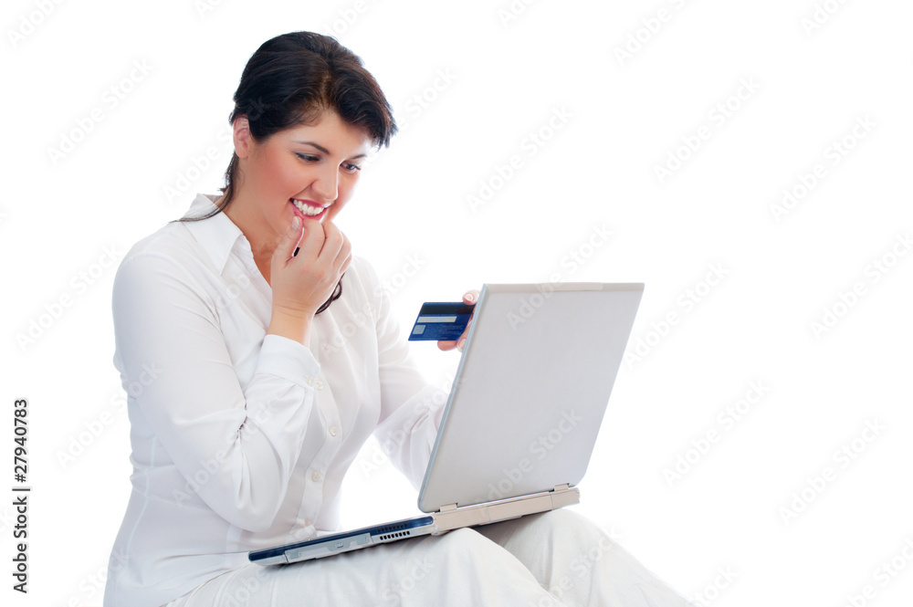 Smiling young woman with credit card and laptop Smiling young woman with credit card and laptop