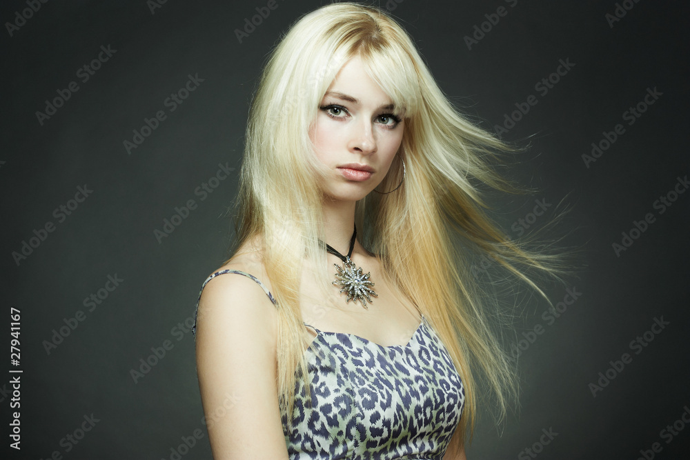 Naklejka premium Fashion portrait of the young blonde woman