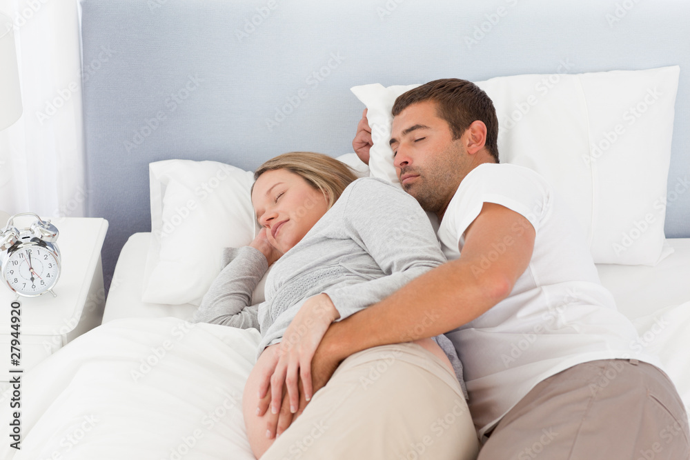 Cute couple of future parents doing a nap Cute couple of future parents doing a nap