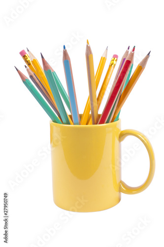 Pencils in cup isolated on white background