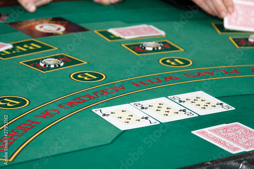 Line up of cards on poker table