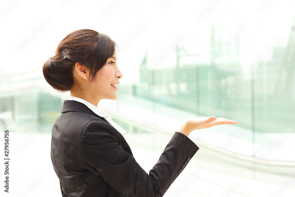 Business woman paying attention to your message or product Business woman paying attention to your message or product