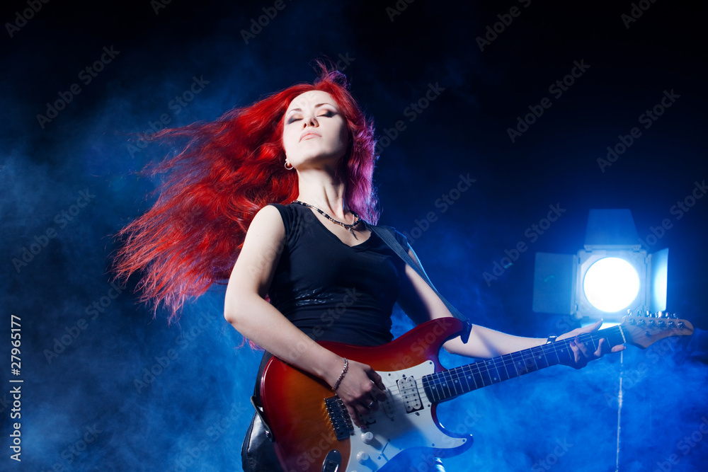 red-haired girl the guitarist