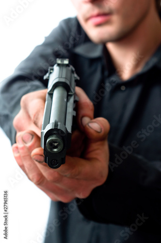 Man with gun focus on pistol with dirty hands
