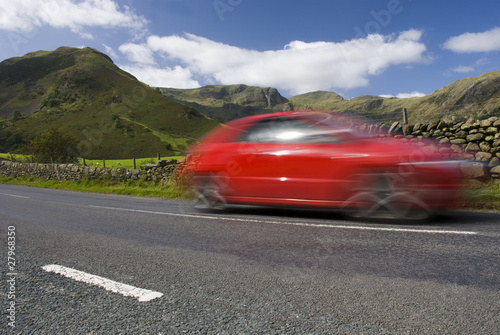 Speeding red car, Lake District National Park © Dariusz Gora