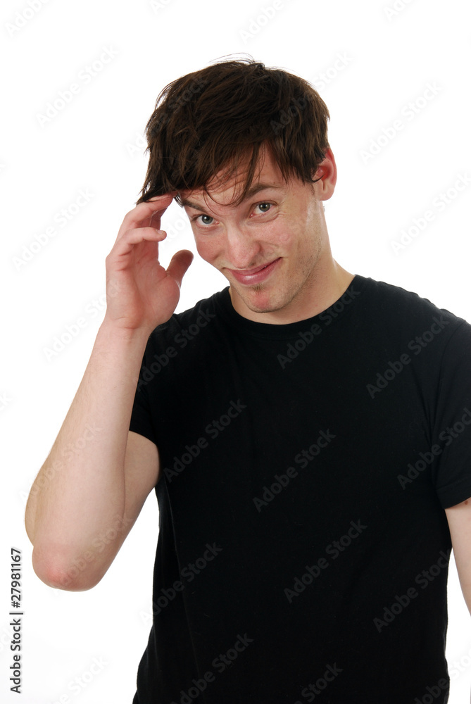 Youthful man scratching his head Youthful man scratching his head