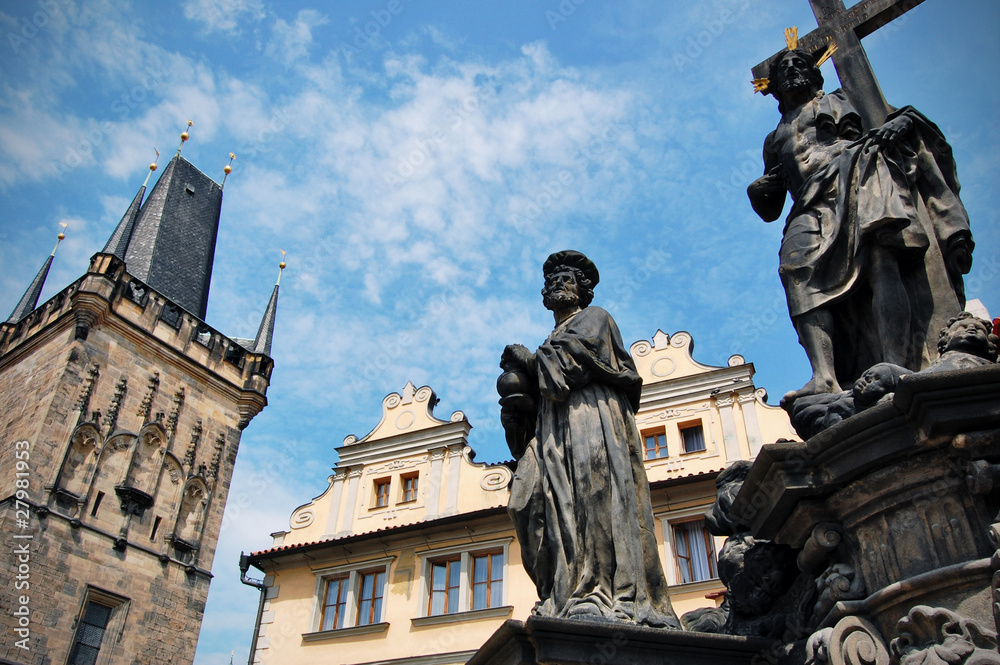 The Black Tower and statues in Prague.