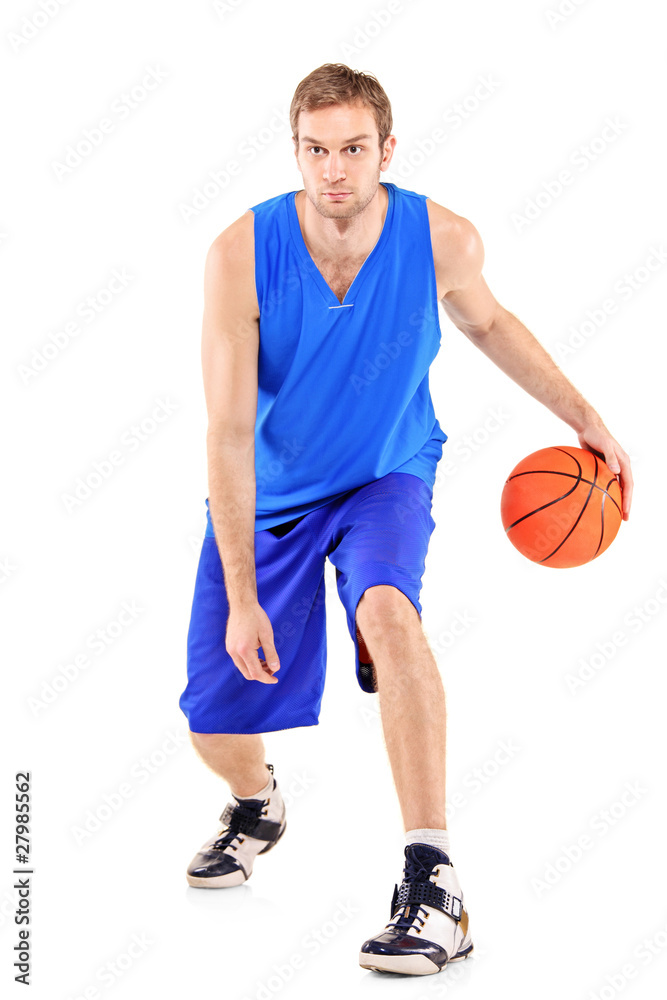 Full length portrait of a basketball player with basketball Full length portrait of a basketball player with basketball